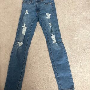 Women's Distressed Blue Jeans